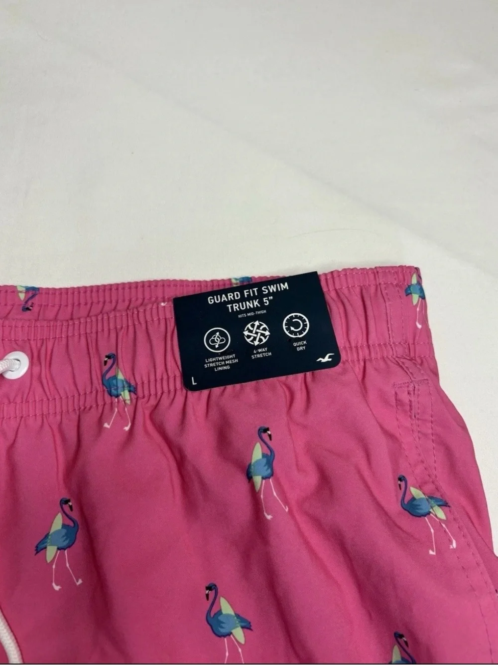 Men’s Hollister Pink Swim Trunks with Blue Flamingo Motif size Large NWT